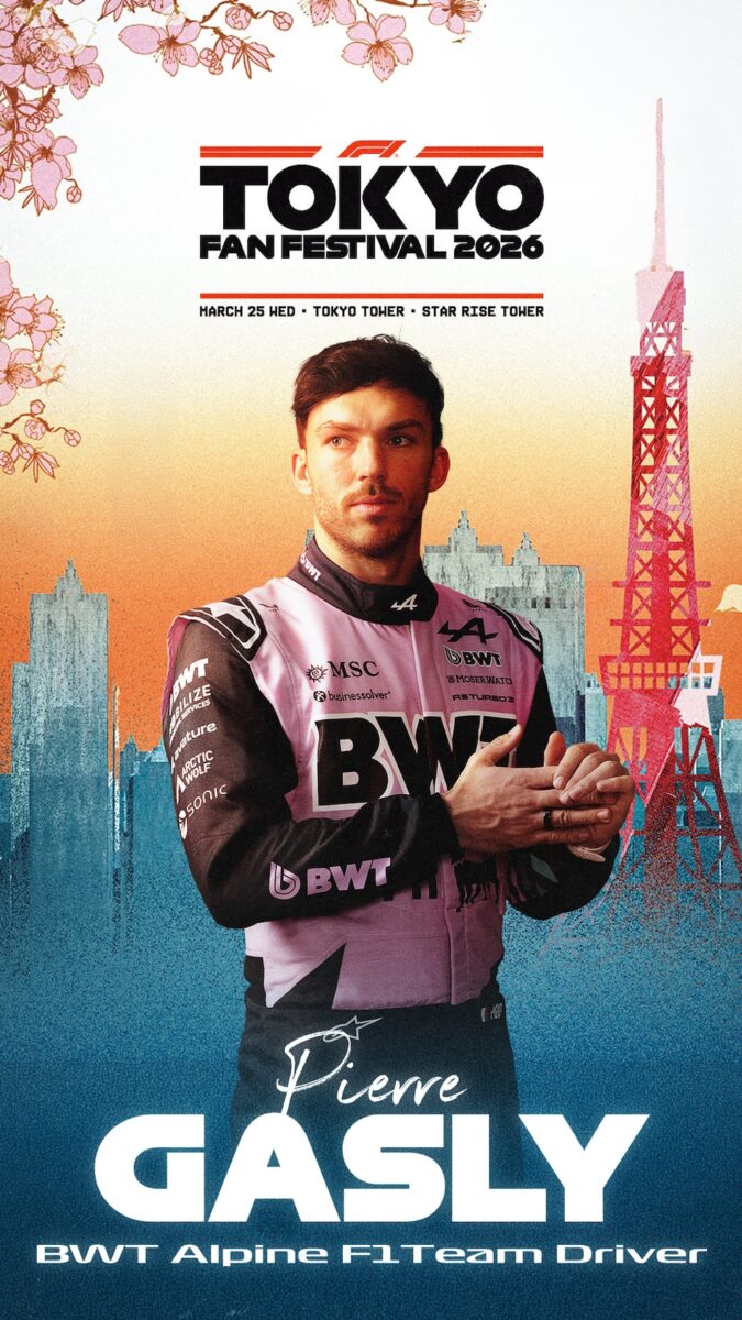 F1 race car displayed at the base of Tokyo Tower during fan festival