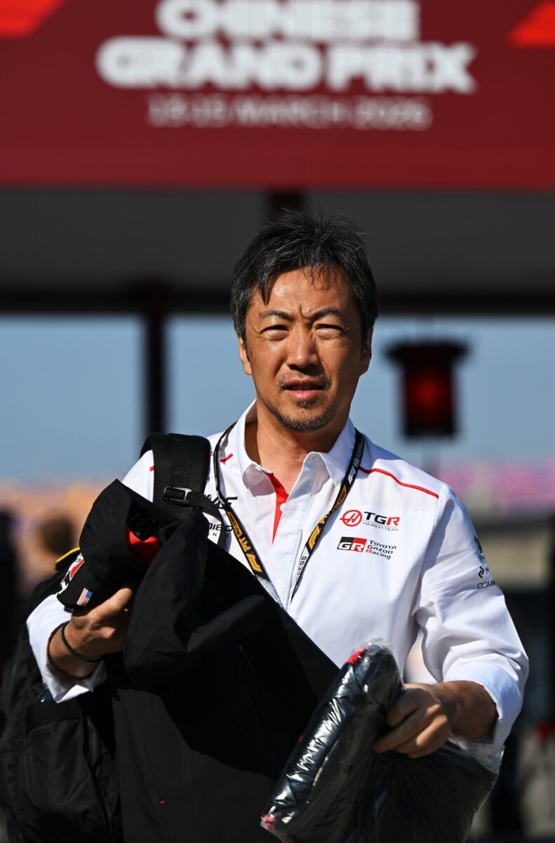 TGR Haas F1 team principal Ayao Komatsu with the 2026 Godzilla collaboration announcement.