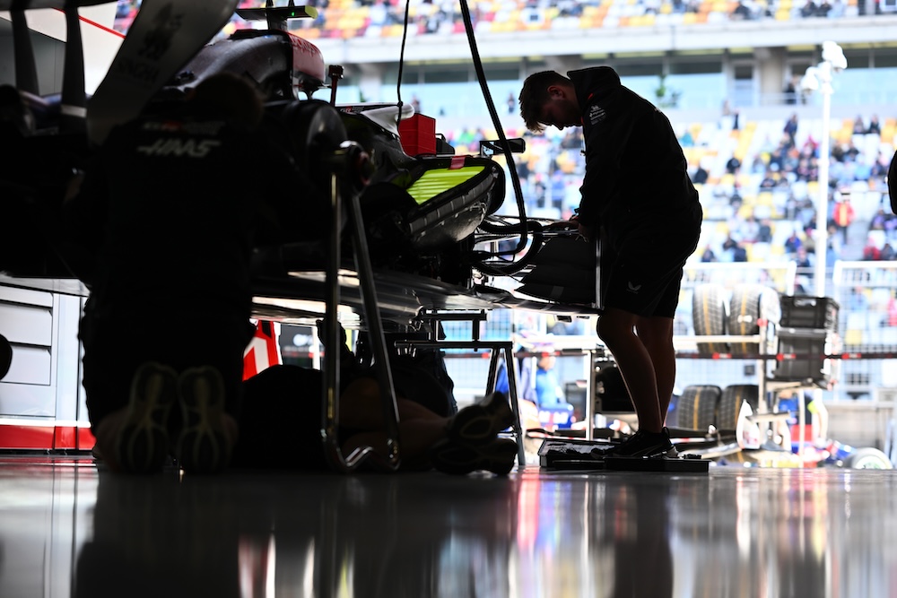 TGR Haas F1 team principal Ayao Komatsu with the 2026 Godzilla collaboration announcement.